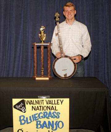 1st Place Banjo Winner, Hudsen Doucette, with Trophy & Prize Banjo