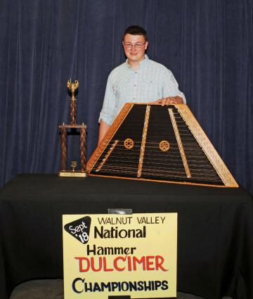 2nd Place Winner, Benjamin Barker, with Trophy and Prize Hammer Duclimer