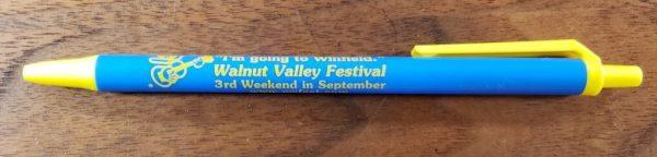 Blue & Yellow pen with Walnut Valley Festival's "Fesity" logo and "I Can't. I'm going to Winfield."