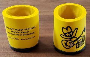 Yellow Rubber Foam Koozie with Walnut Valley's "Fesity" logo printed in black