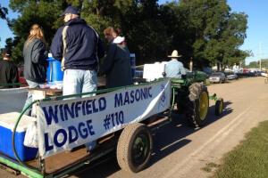 The Winfield Masonic Lodge selling donuts and coffee on the Johnny Popper Tractors