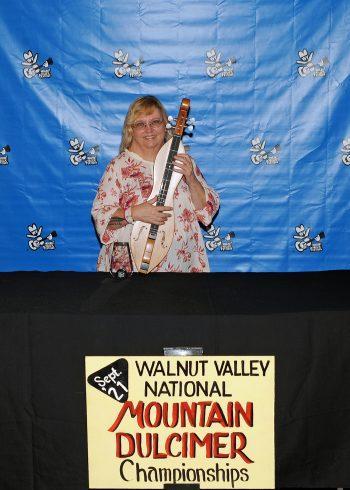 Irma Reeder, 3rd Place Winner, 
2021 National Mountain Dulcimer Championship,
back stage promo