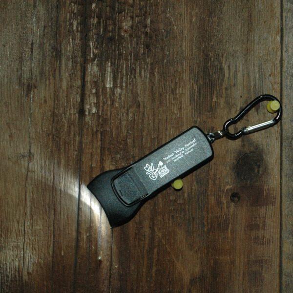 Black LED, Keychain Flashlight, reads "Walnut Valley Festival, 3rd Weekend in September, Winfield, Kansas"