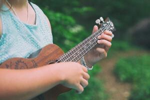 Girl playing ukulele